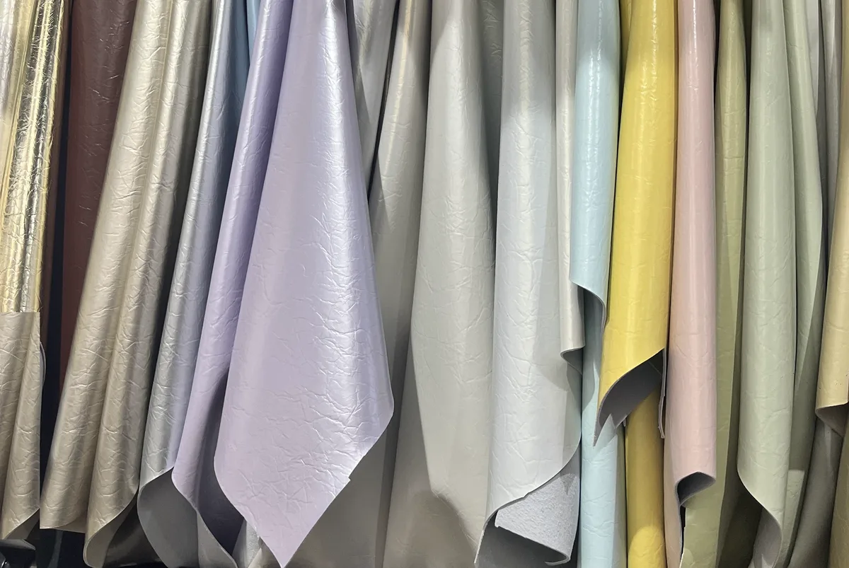 Top-grain leather hides in pastel, metallic and bright color options at the Chengdu material market